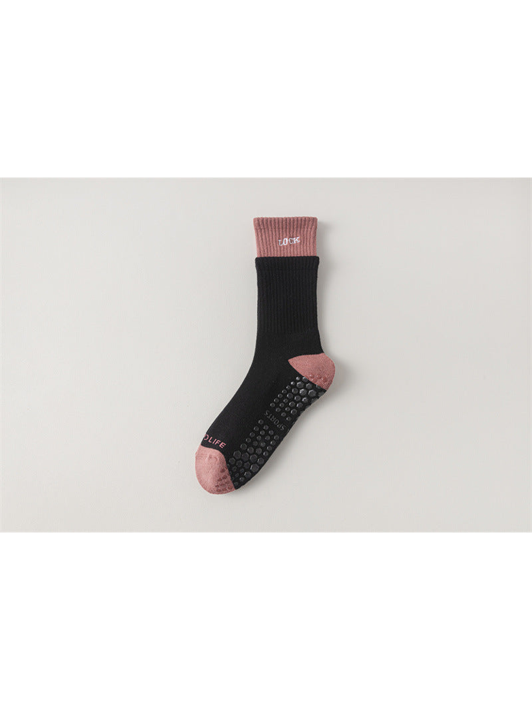 Black crew sock with dusty pink cuff, toe and heel, flat view