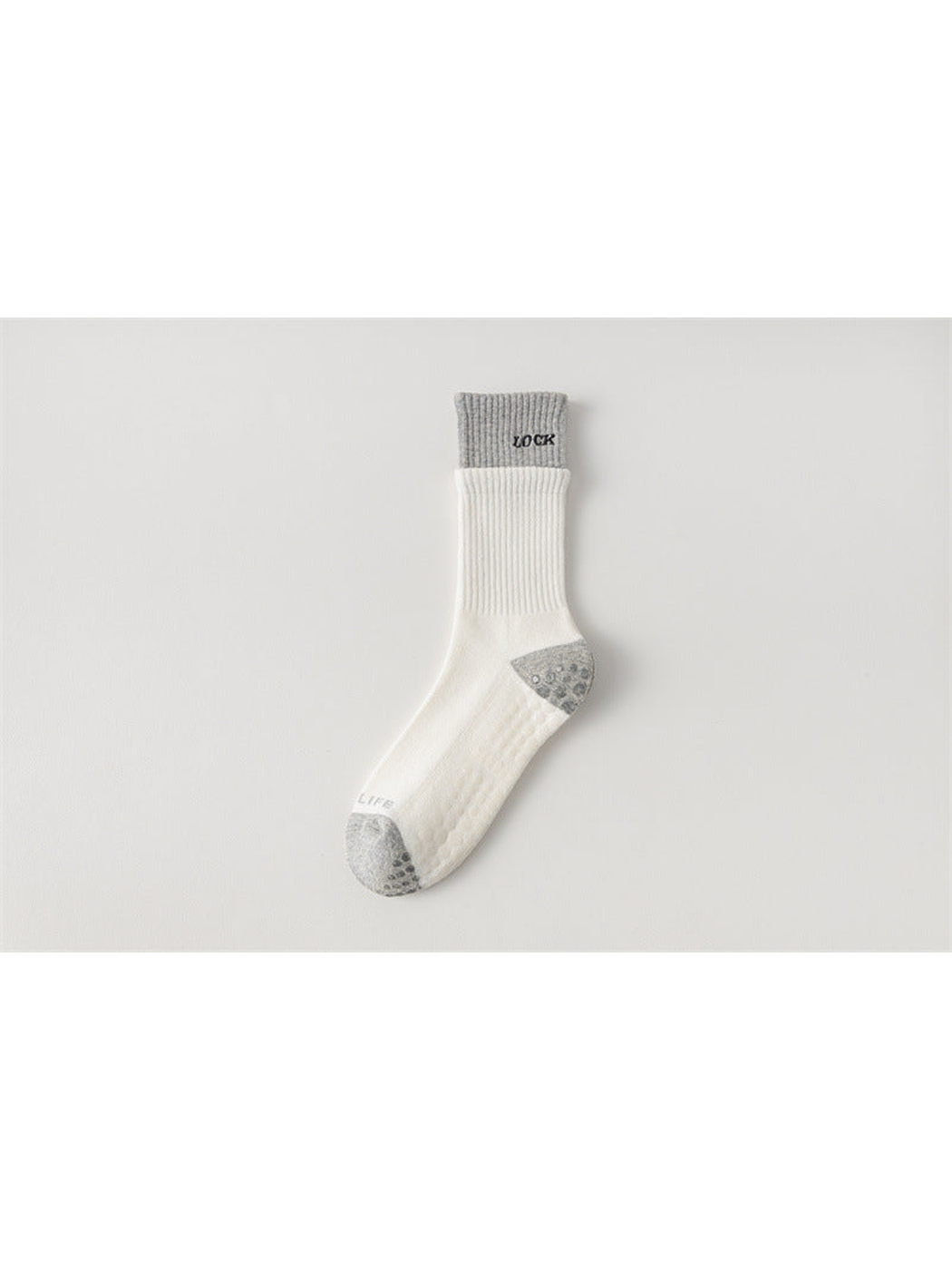 Ivory crew sock with light gray cuff, toe and heel, flat view