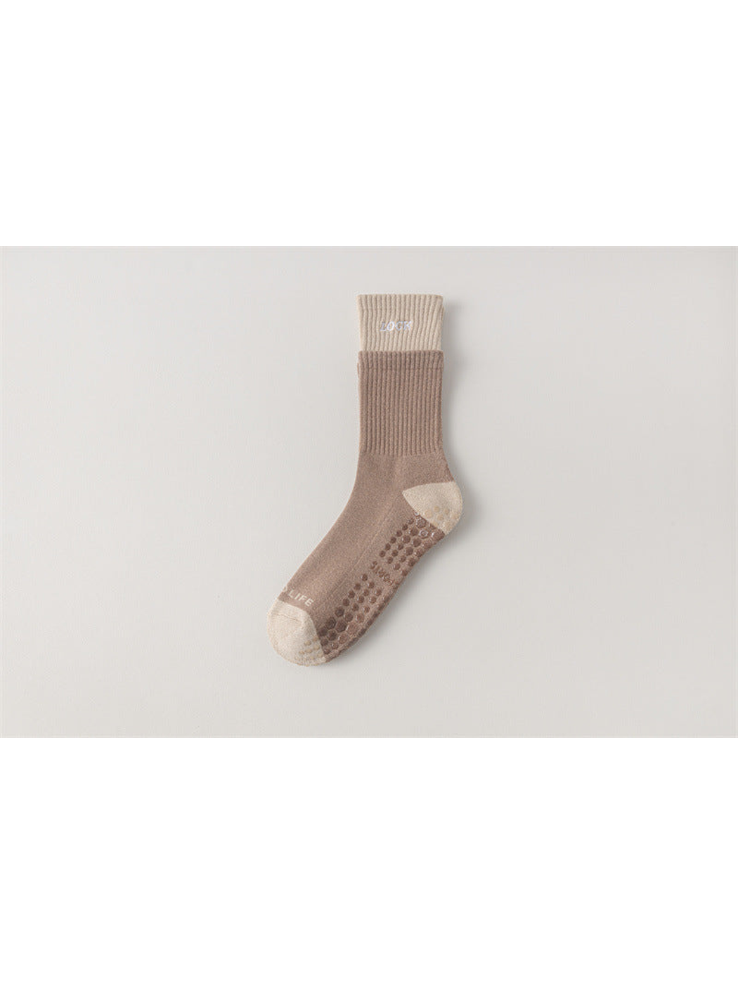 Greige crew sock with cream cuff, toe and heel, flat view