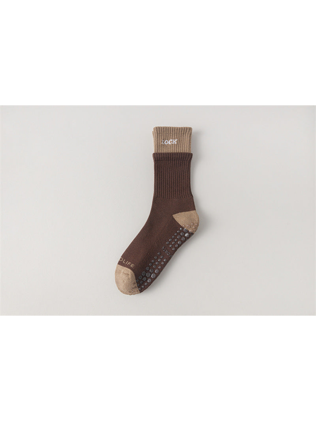 Dark brown crew sock with camel cuff, toe and heel, flat view