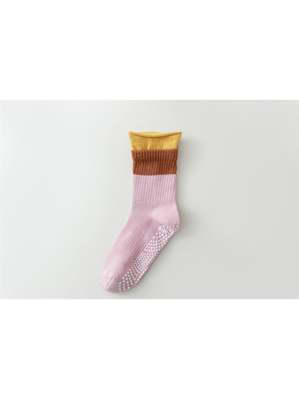Pink color-blocked crew sock with brown band and yellow rolled edge