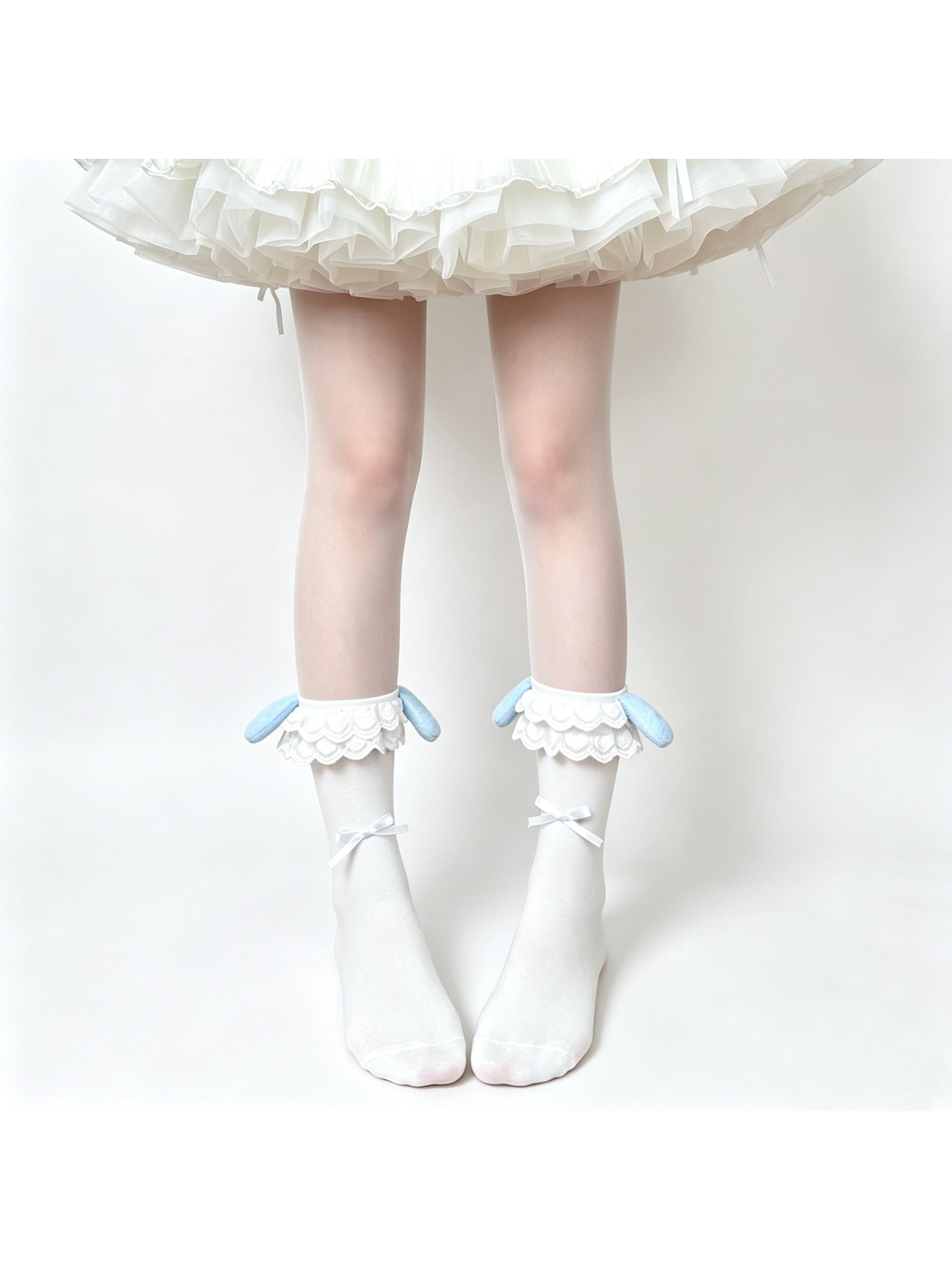 White ankle socks with layered lace cuffs, light blue rabbit-ear accents and ribbon bows