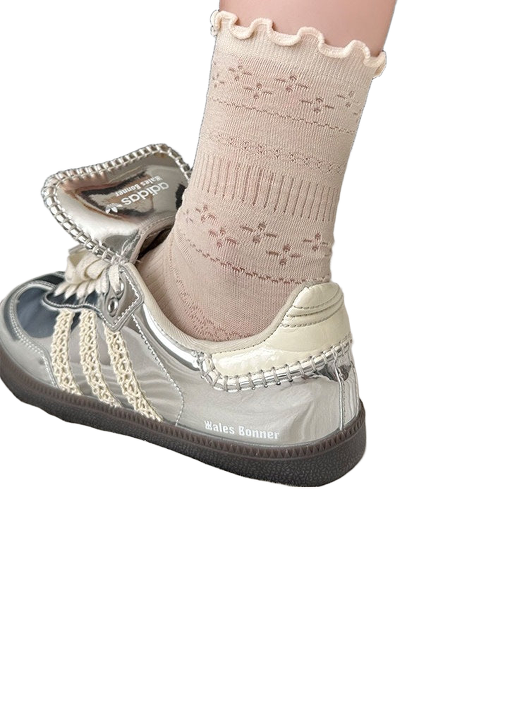 Light beige pointelle crew sock with a ruffled cuff