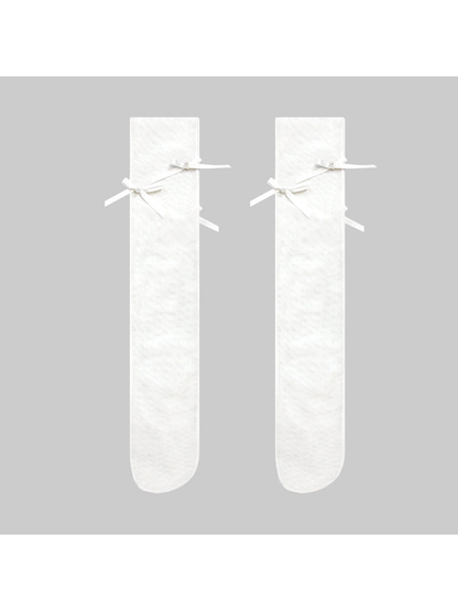 White sheer knee-high socks with ribbon bows and pearl-like centers