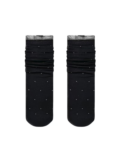 Black dotted crew socks with sheer ruffled cuffs