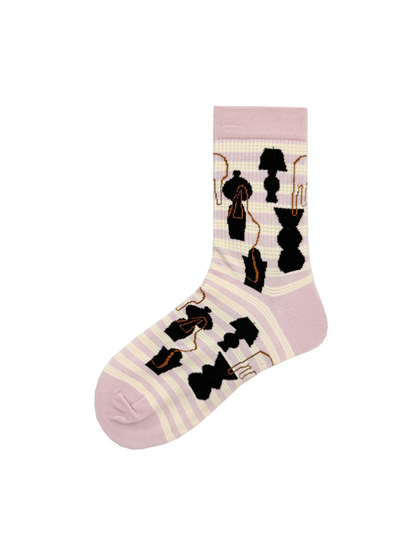 Light pink crew sock with striped abstract silhouette pattern
