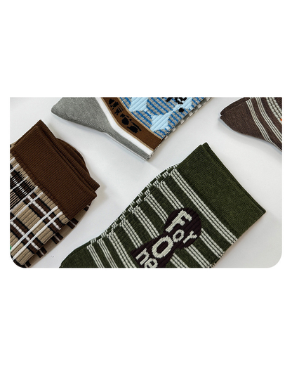 Assorted patterned crew socks arranged together in multiple colors