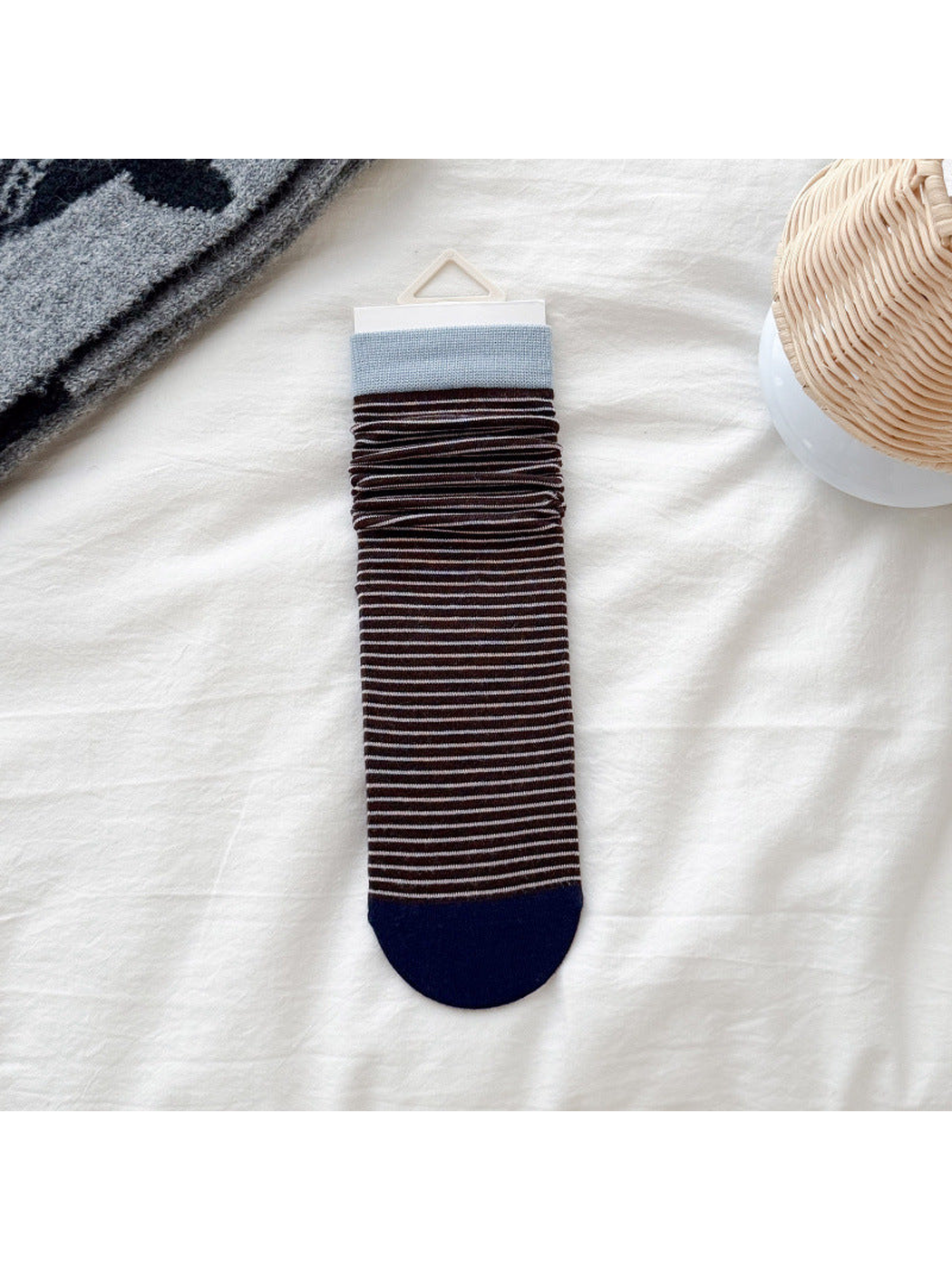 Light blue cuff striped crew sock with navy toe, flat display