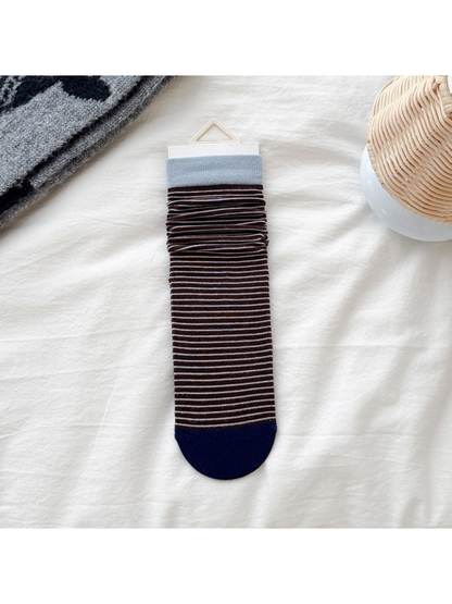 Light blue cuff striped crew sock with navy toe, flat display