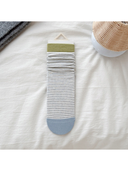 Green cuff white striped crew sock with light blue toe, flat display
