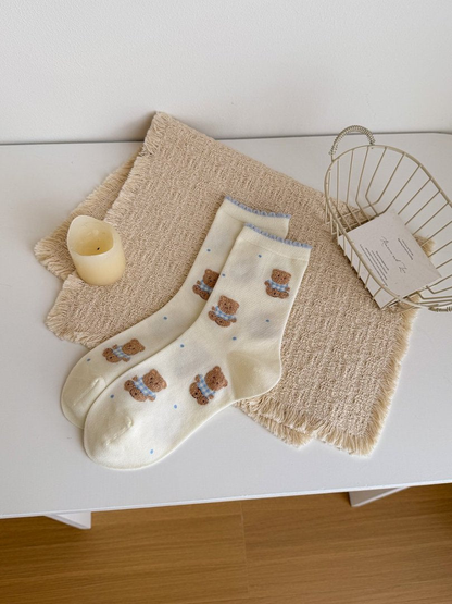 Ivory crew socks with an all-over teddy bear pattern