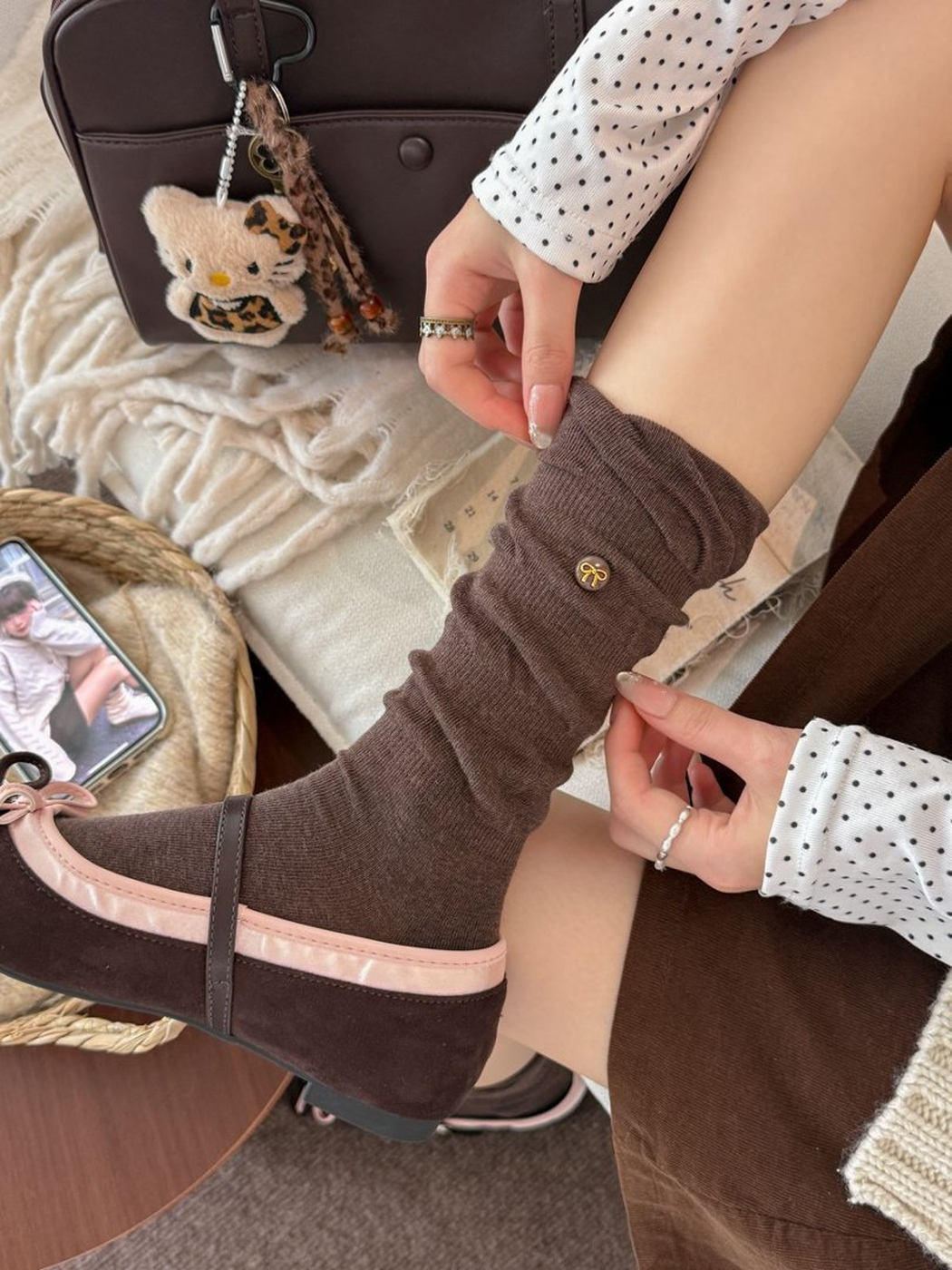 Brown gathered crew sock styled with a brown Mary Jane shoe