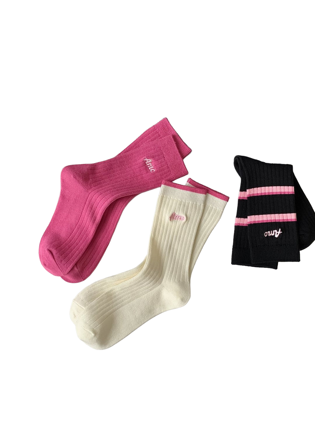 Pink, ivory and black ribbed crew socks arranged together