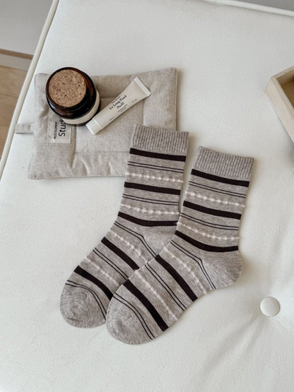 Oatmeal crew socks with brown and white horizontal stripes