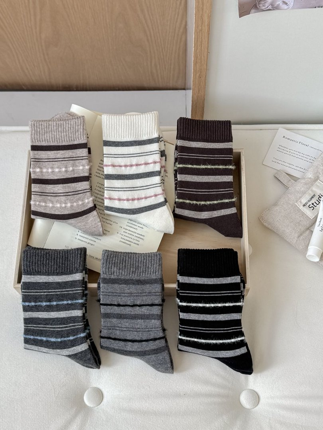 Six striped crew sock colors arranged together