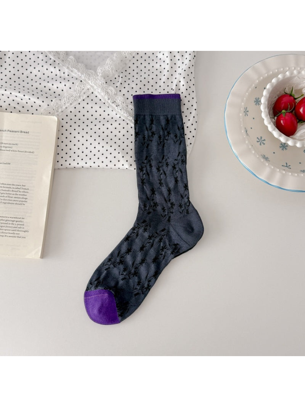 Gray-blue floral openwork crew sock with purple toe and cuff trim