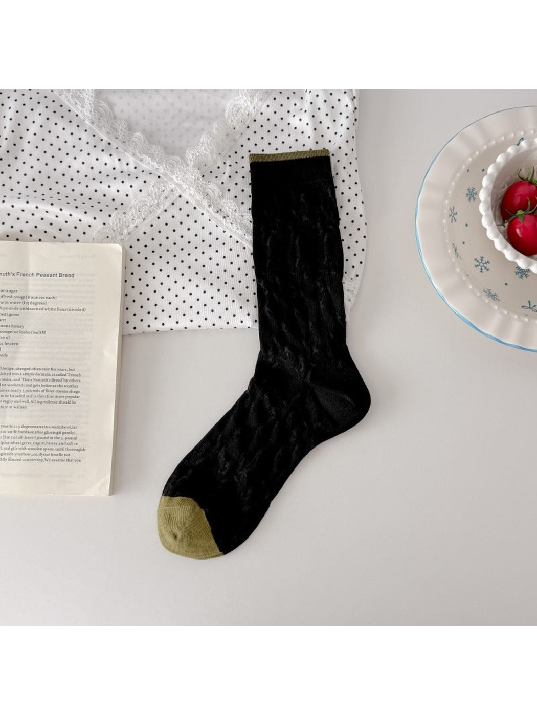Black floral openwork crew sock with olive toe and cuff trim