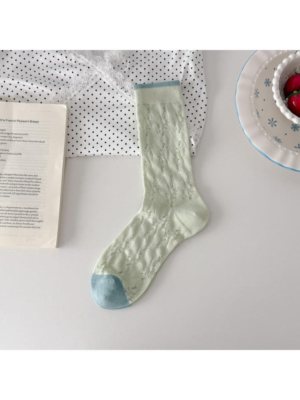 Mint green floral openwork crew sock with pale blue toe and cuff trim