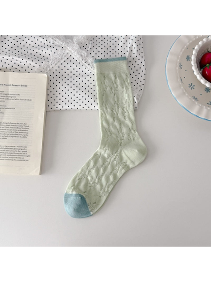 Mint green floral openwork crew sock with pale blue toe and cuff trim