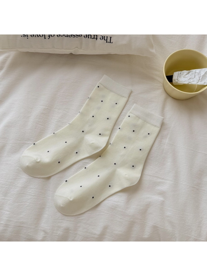 Ivory crew socks with widely spaced dark dots