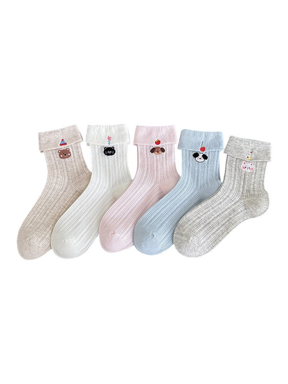 Five colors of pointelle crew socks with folded cuffs and embroidered animal motifs