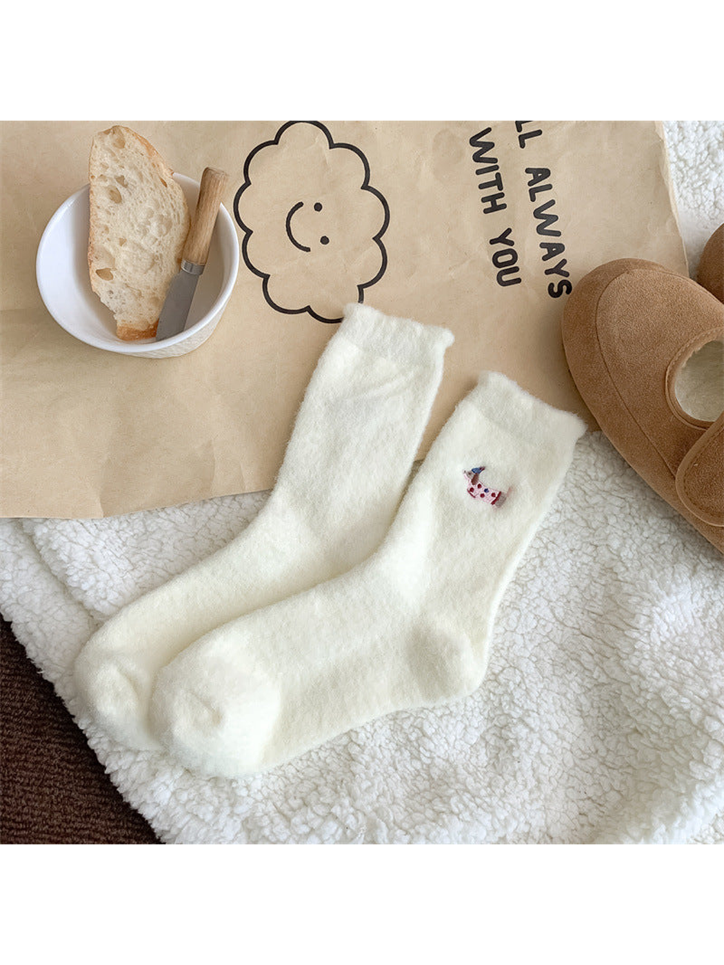 Ivory fuzzy crew socks with pink-spotted dog embroidery