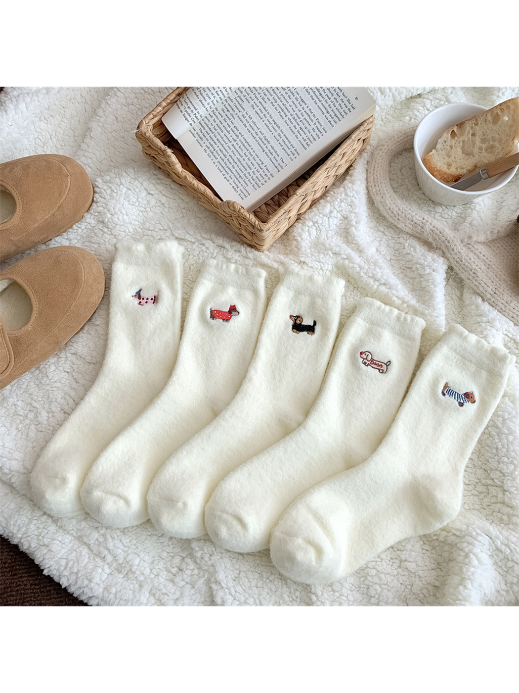 Five ivory fuzzy crew sock styles with embroidered dog motifs
