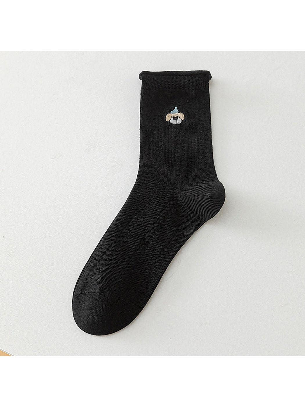 Black crew sock with a blue-cap dog motif, full product view