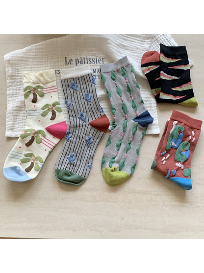 Five colorful patterned crew sock styles displayed together