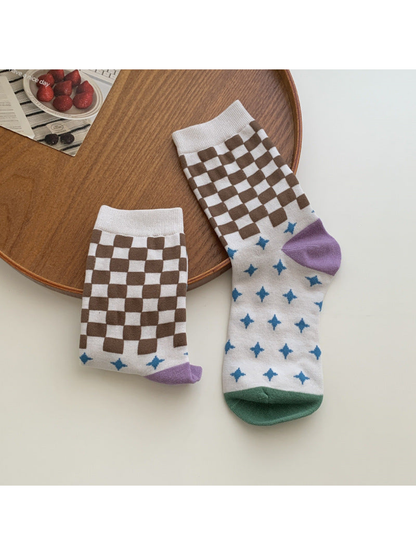 Ivory crew socks with brown checks, blue stars and contrasting toes