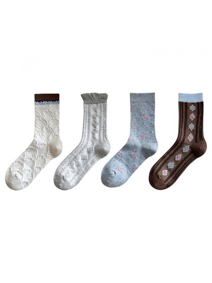 Four patterned crew sock styles displayed on a white background