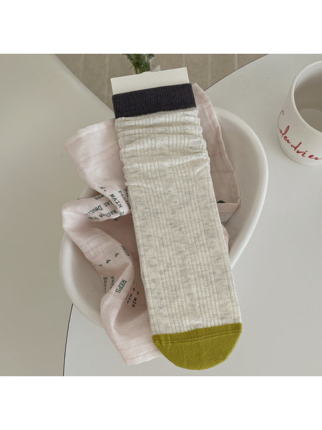 Greige ribbed crew sock with charcoal cuff and mustard toe