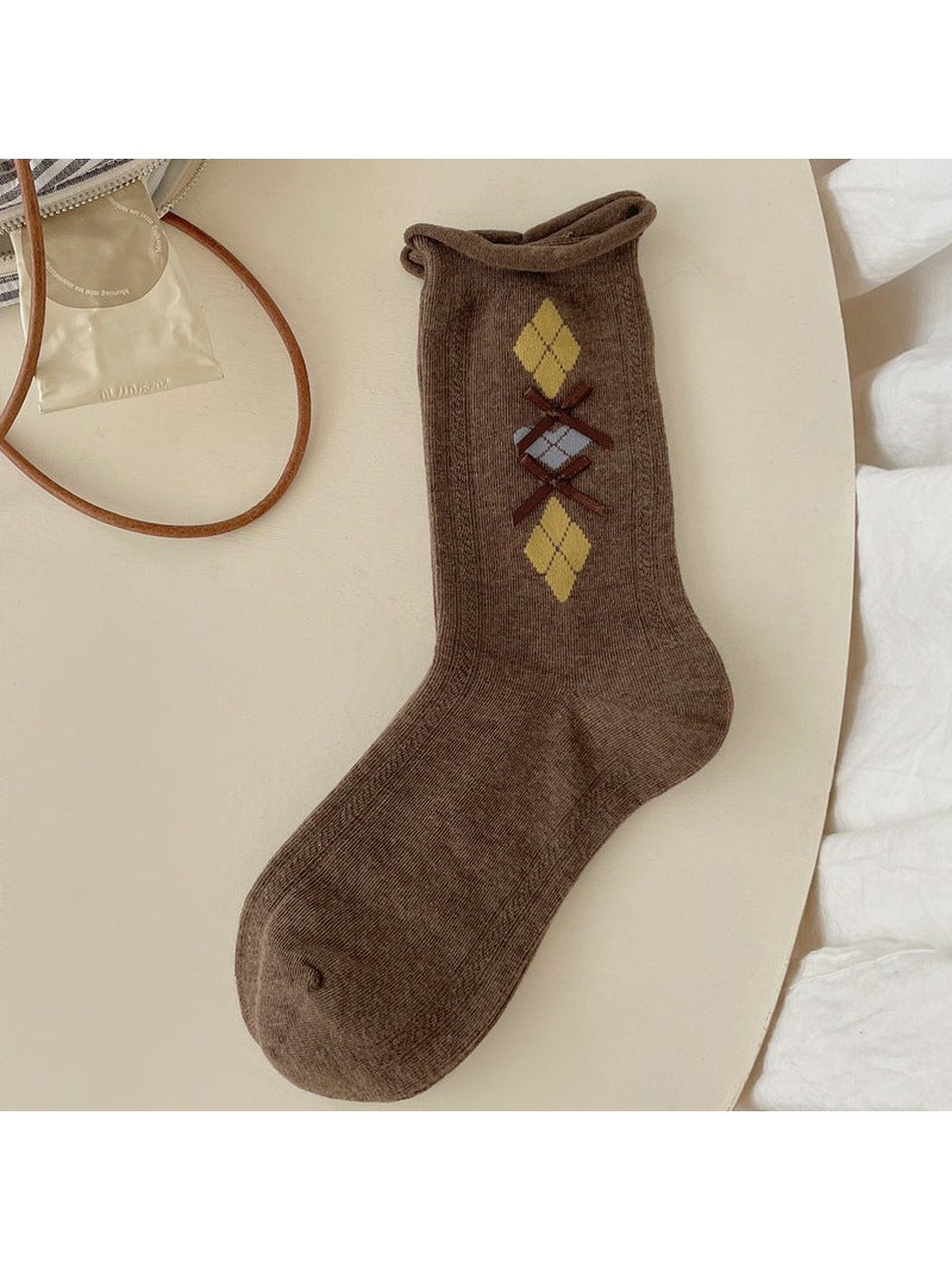 Dark brown argyle crew sock with brown ribbon bows