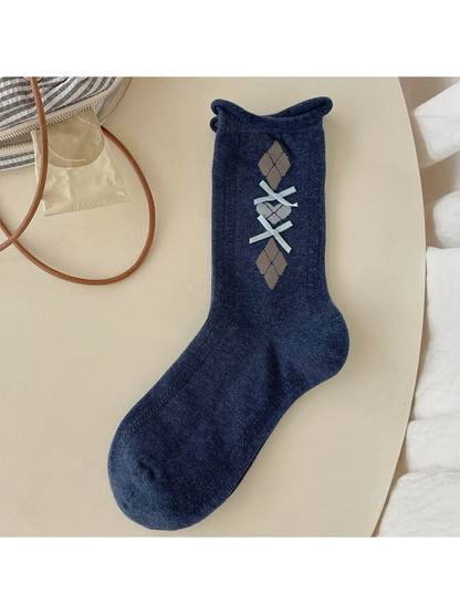 Navy argyle crew sock with pale blue ribbon bows