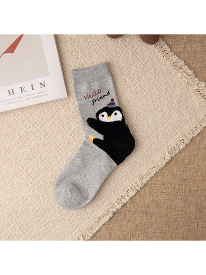 Light gray crew sock with waving penguin motif