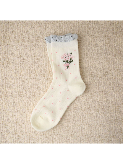 Ivory crew sock with pink bouquet, dotted pattern and ruffled cuff