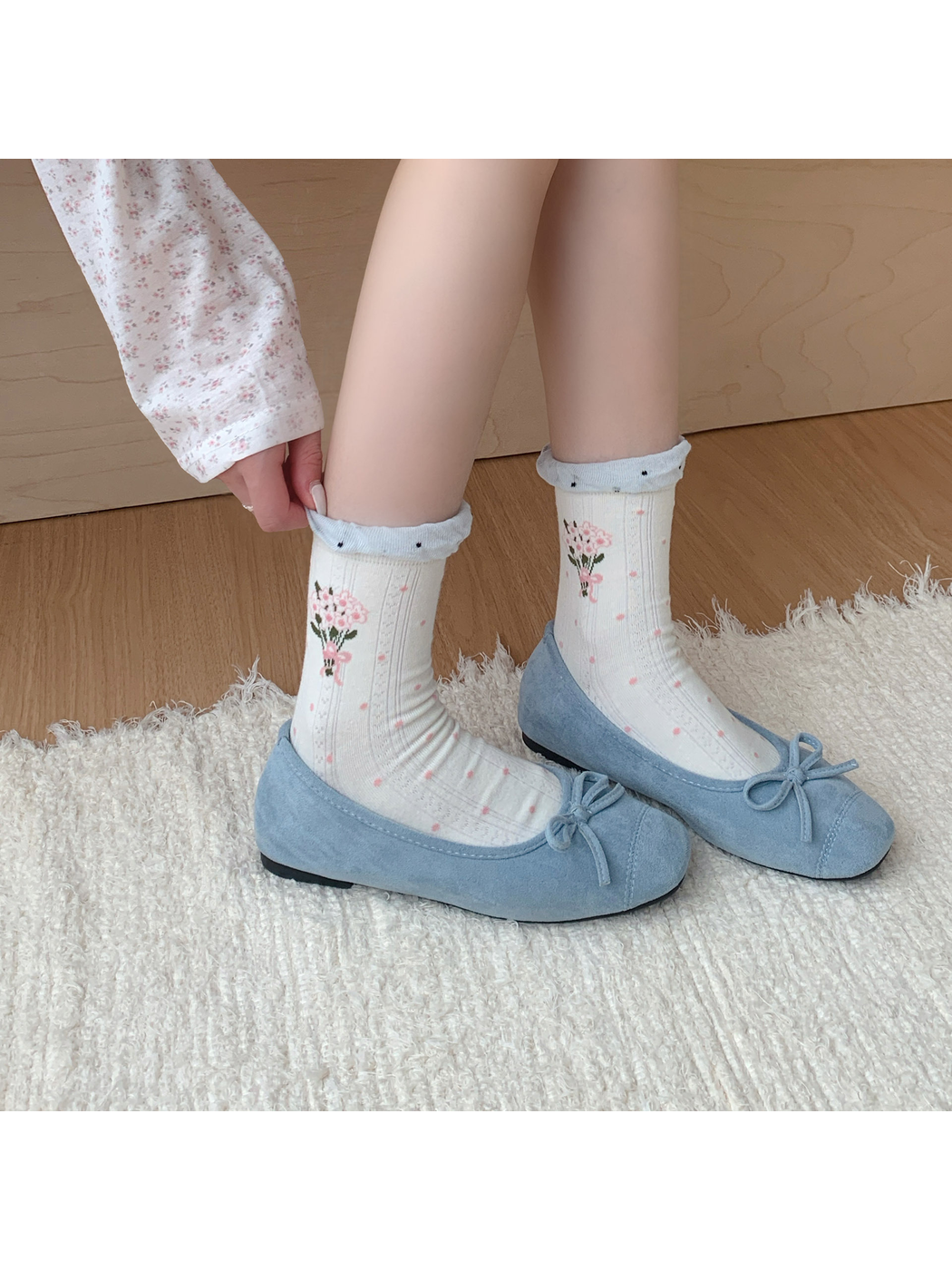 Ivory pink bouquet crew socks worn with light blue ballet flats