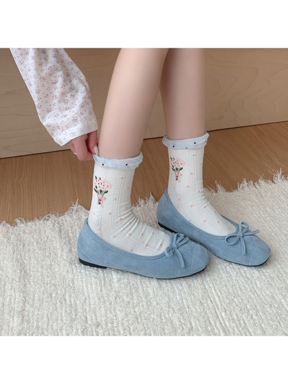 Ivory pink bouquet crew socks worn with light blue ballet flats