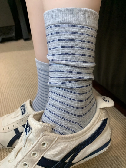 Light gray crew sock with fine navy stripes