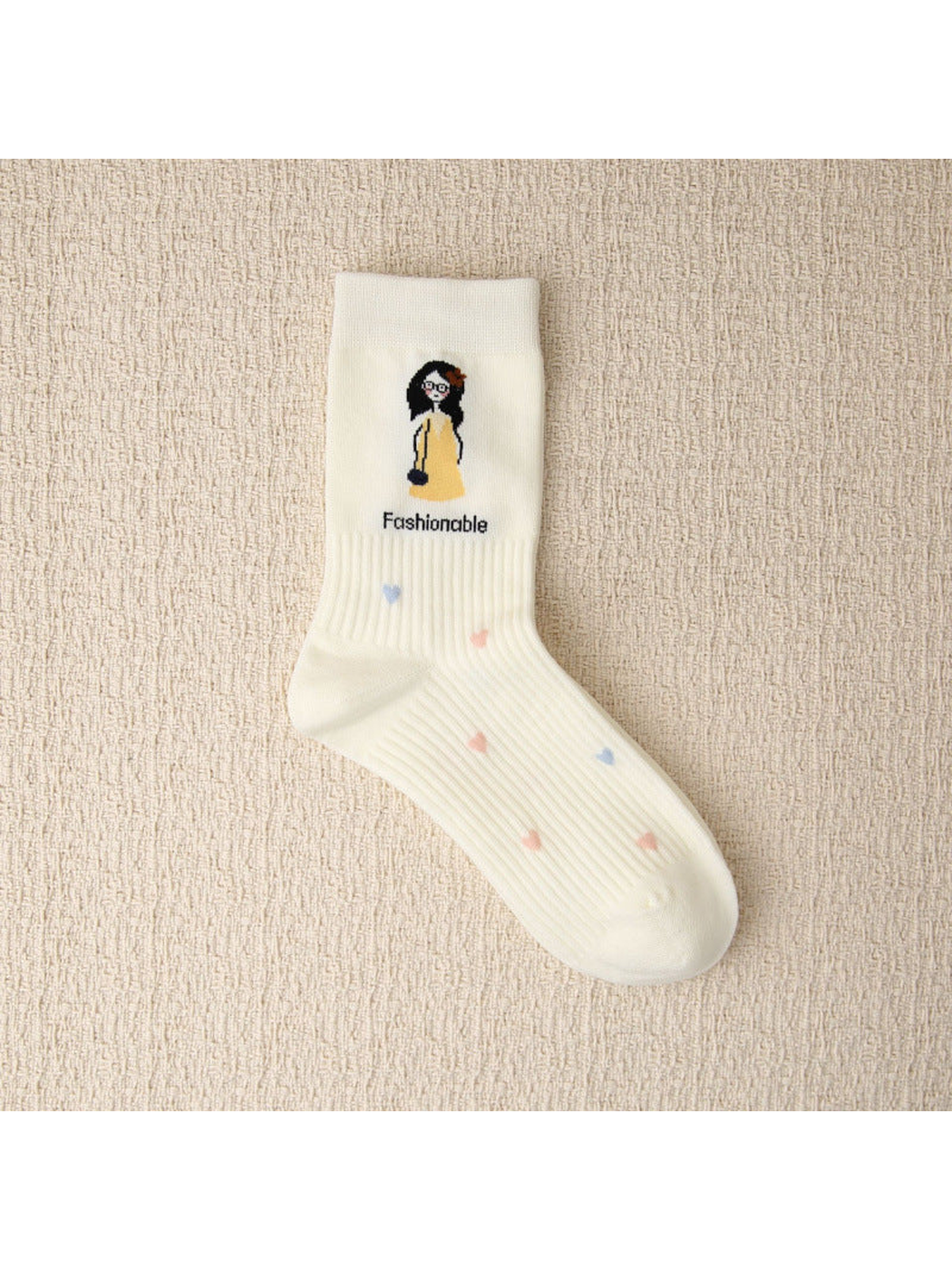 Ivory crew sock with cartoon woman and heart motifs