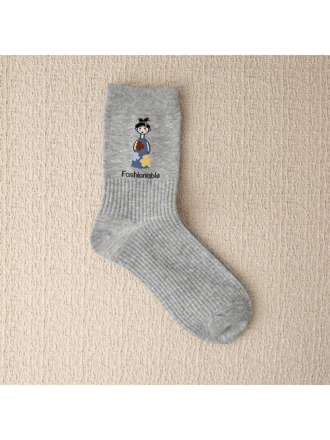 Heather gray crew sock with cartoon girl and blue dot motifs