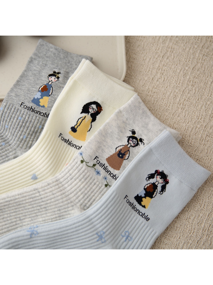 Close-up of four cartoon motifs and ribbed accent patterns