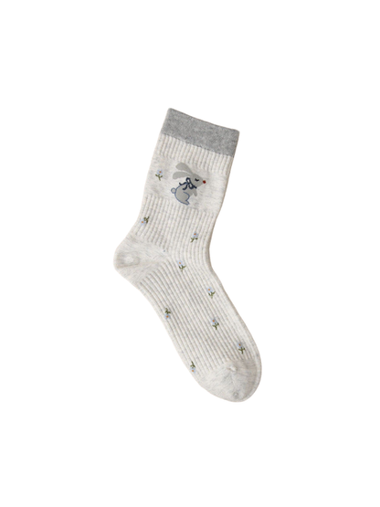 Light gray ribbed crew sock with rabbit and tiny flower motifs