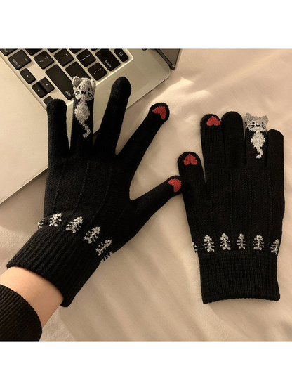 Black knit gloves with cat finger motif and ribbed cuffs