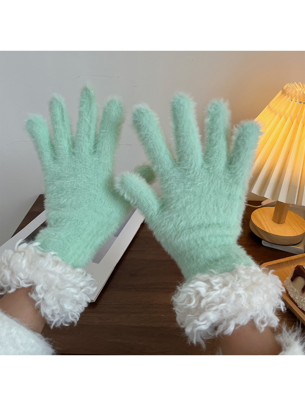 Mint fuzzy gloves with curly white cuffs, pair view