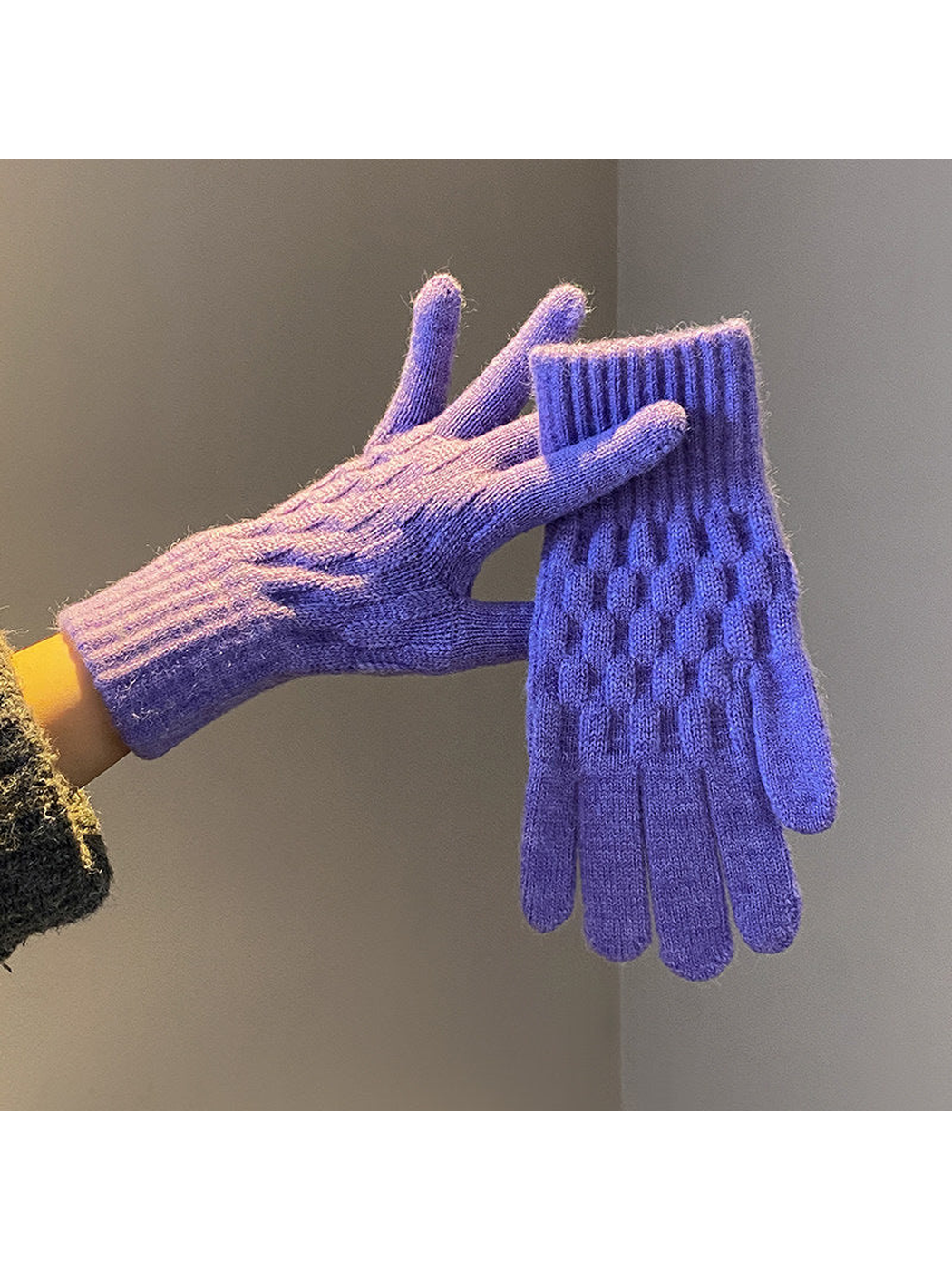 Purple cable-knit gloves with ribbed cuffs, worn and held view