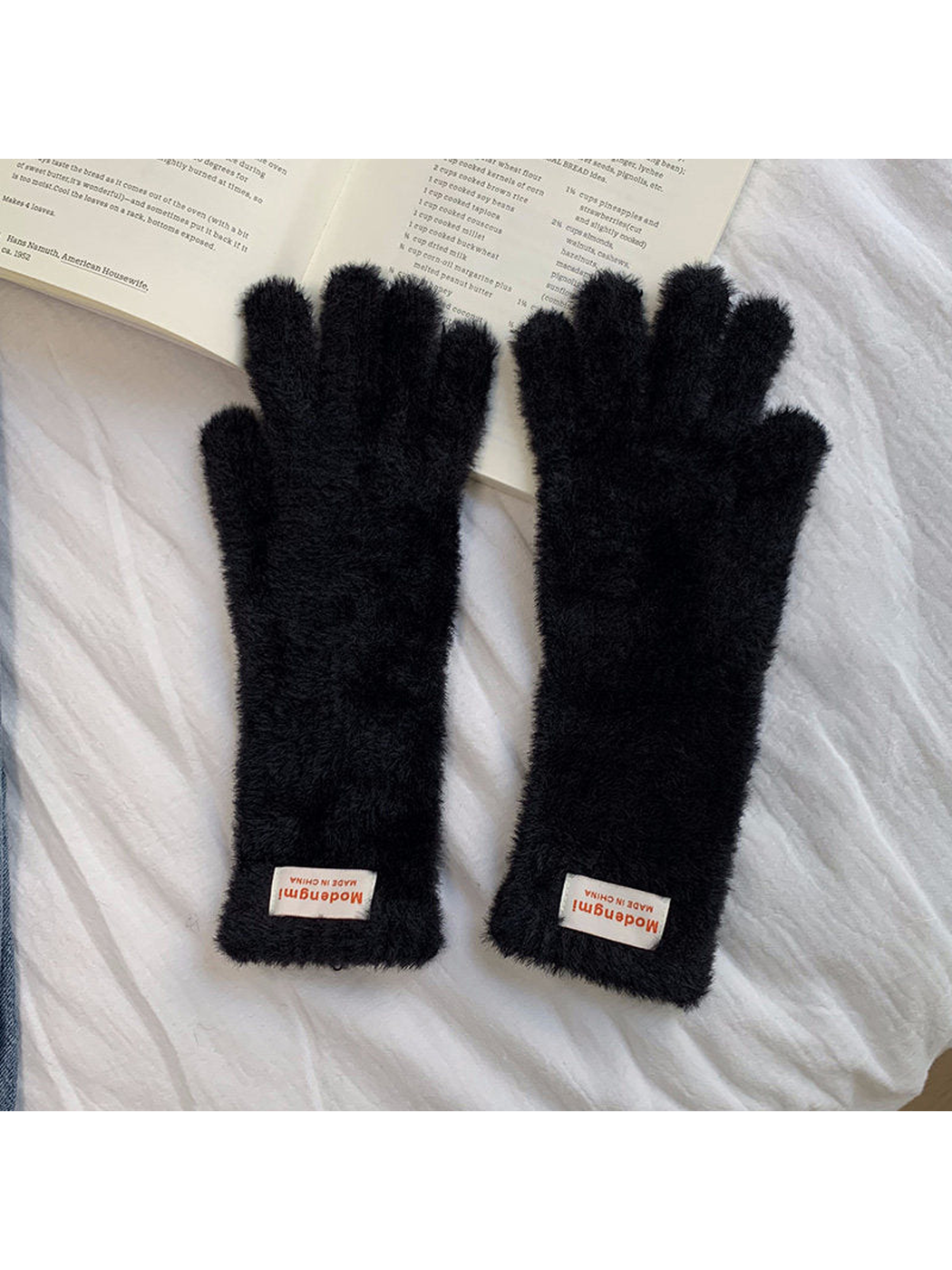 Black fuzzy gloves with extended cuffs, front view