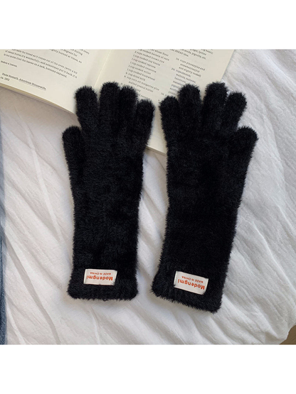 Black fuzzy gloves with extended cuffs, front view