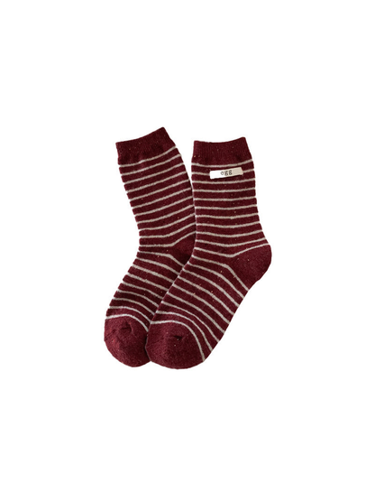Burgundy crew socks with narrow cream stripes