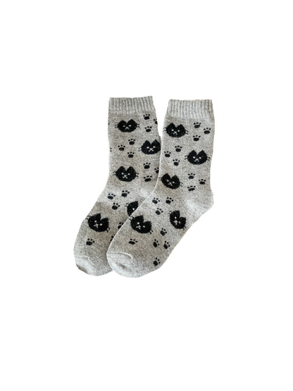 Light gray crew socks with black cat faces and paw prints